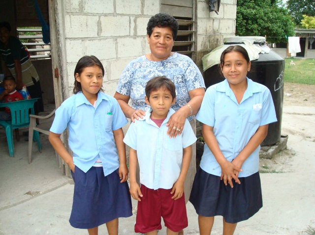 Three kids and a woman from Belize