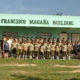 Large group of scholarship students in front of the Francisco Magana Building